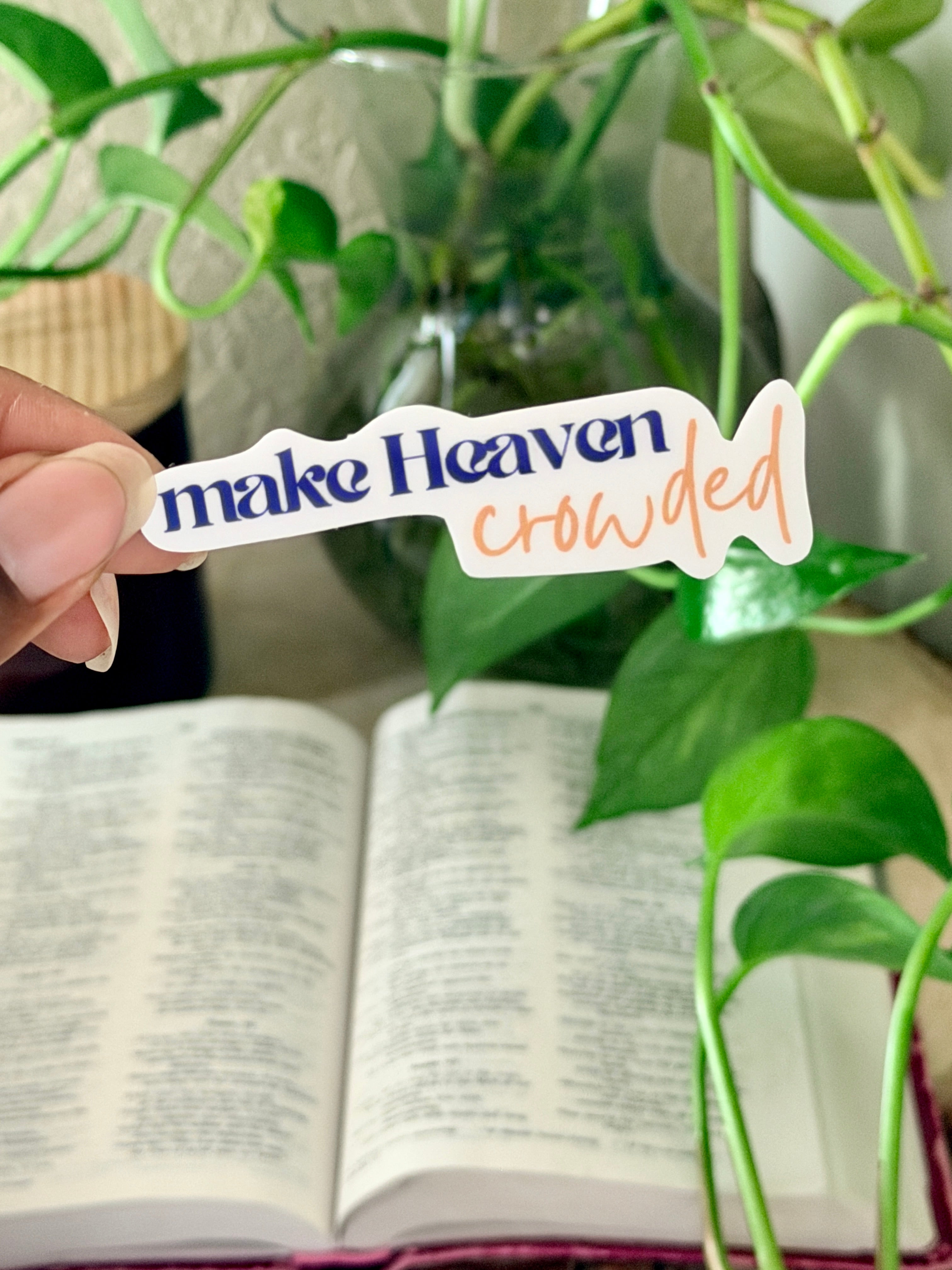 Vinyl Christian sticker that says "make Heaven crowded" in purple and gold